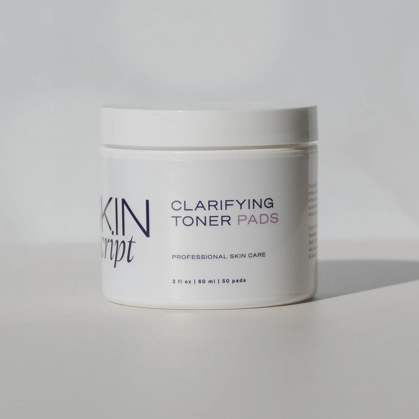 Clarifying toner pads